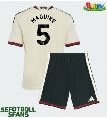 Manchester United Harry Maguire #5 Tredjeställ Barn 2026-27 Kortärmad (+ Korta byxor)